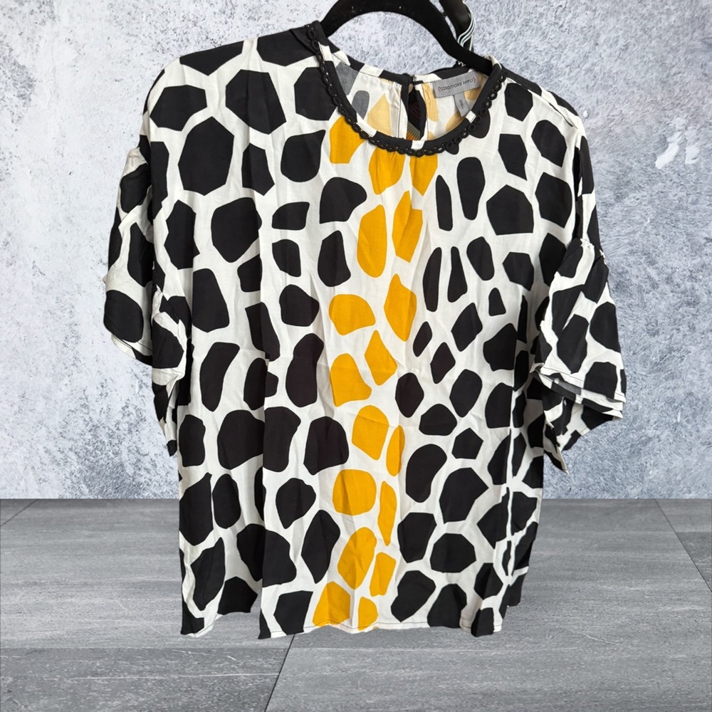 Conditions apply for Bl^nk London pullover top with back button NWOT